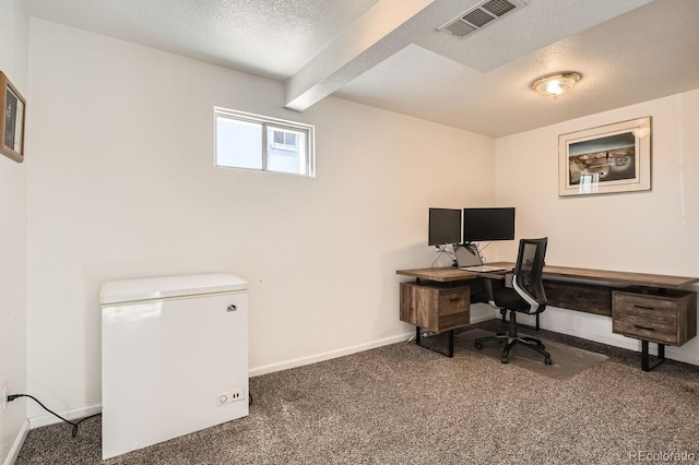 office space featuring beam ceiling, a textured ceiling, and dark colored carpet