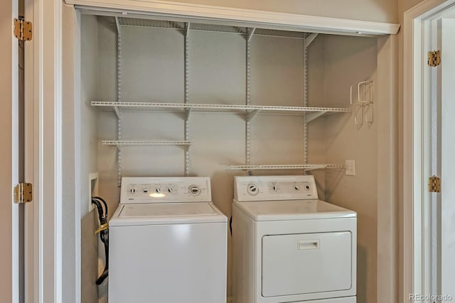 14251 E 1st Dr Unit 308, Aurora, CO 80011 - laundry room with washing machine and dryer
