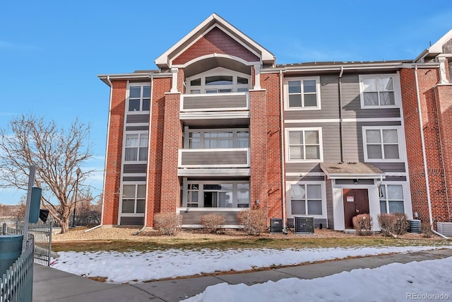 14251 E 1st Dr Unit 308, Aurora, CO 80011 - snow covered building featuring central AC