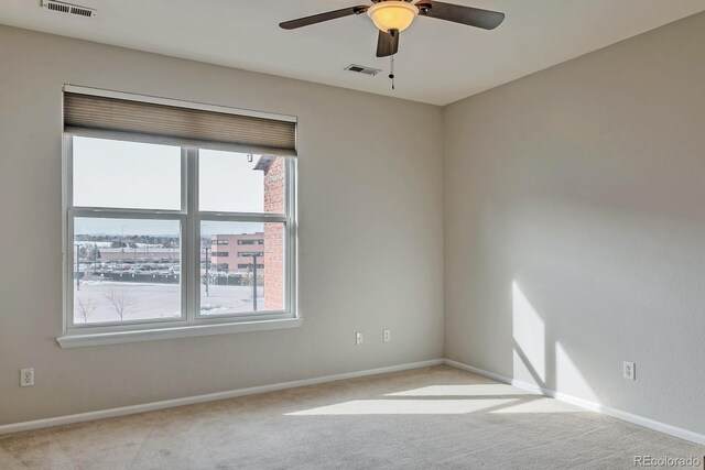 14251 E 1st Dr Unit 308, Aurora, CO 80011 - empty room with carpet floors, baseboards, and ceiling fan