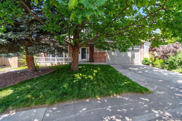 5625 W 109th Cir, Westminster, CO 80020 - obstructed view of property with driveway, brick siding, a front lawn, and a garage