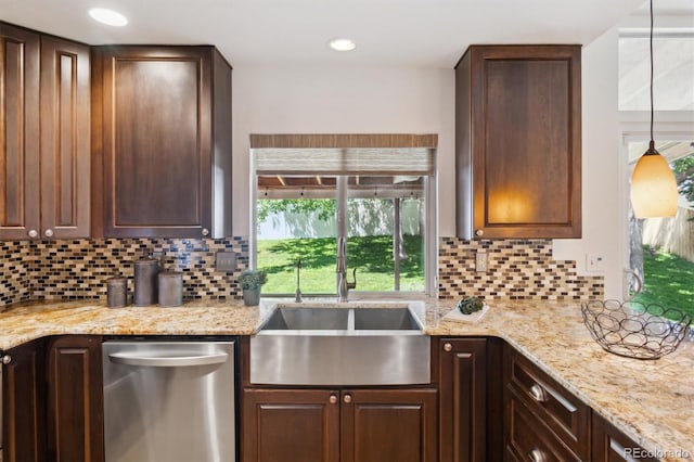 5625 W 109th Cir, Westminster, CO 80020 - kitchen featuring dishwasher, dark brown cabinetry, and decorative backsplash