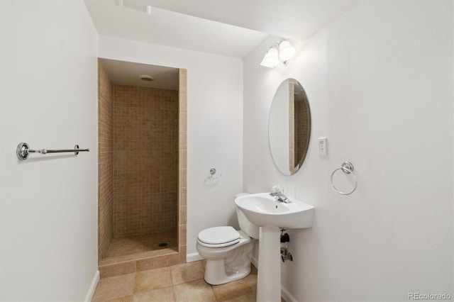 5625 W 109th Cir, Westminster, CO 80020 - bathroom featuring a tile shower and tile patterned floors