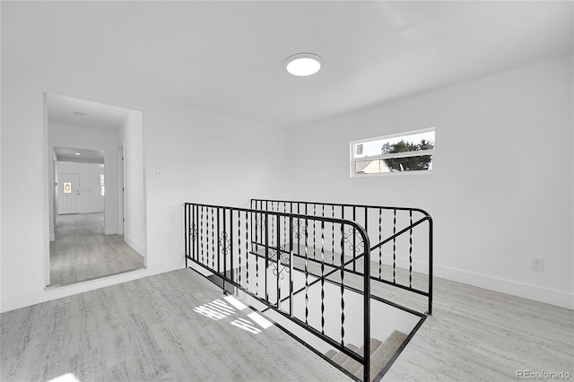 unfurnished bedroom featuring light wood-type flooring