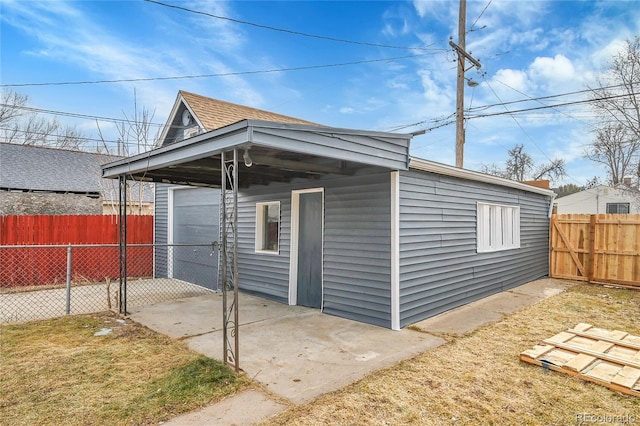 view of outbuilding with a yard