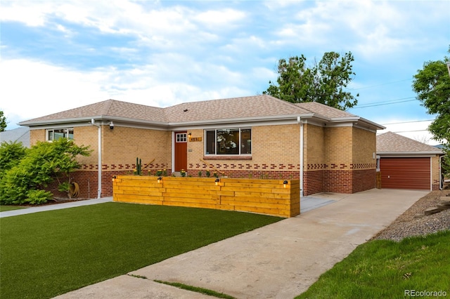4891 Depew St, Denver, CO 80212 - ranch-style home with brick siding, a front yard, and roof with shingles