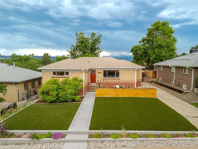 4891 Depew St, Denver, CO 80212 - view of front facade featuring brick siding