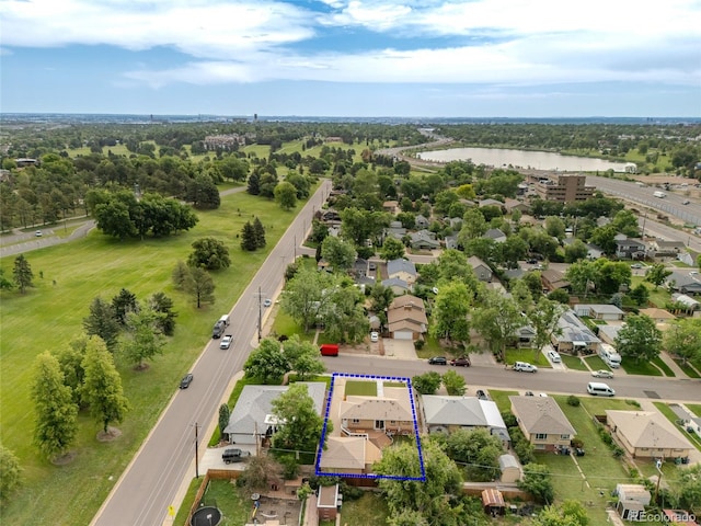 4891 Depew St, Denver, CO 80212 - aerial view of residential area with property parcel outlined and a large body of water
