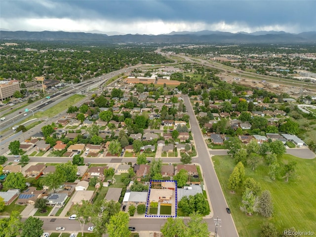 4891 Depew St, Denver, CO 80212 - aerial perspective of suburban area featuring a mountainous background and property parcel outlined