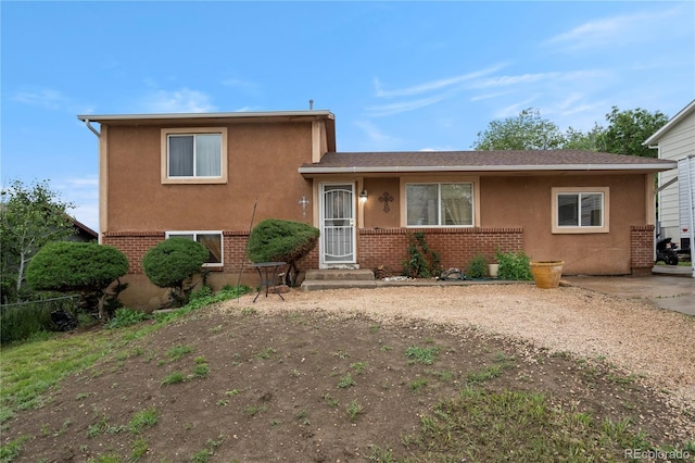 4345 S Chamberlin, Colorado Springs, CO 80906 - tri-level home with stucco siding and brick siding