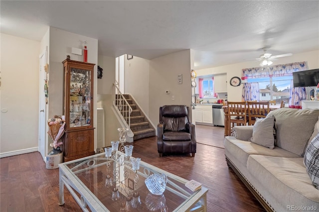 4345 S Chamberlin, Colorado Springs, CO 80906 - living room with wood finished floors, a ceiling fan, stairway, and baseboards