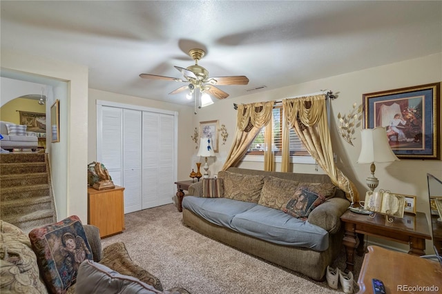 4345 S Chamberlin, Colorado Springs, CO 80906 - living room featuring carpet flooring, ceiling fan, and stairway