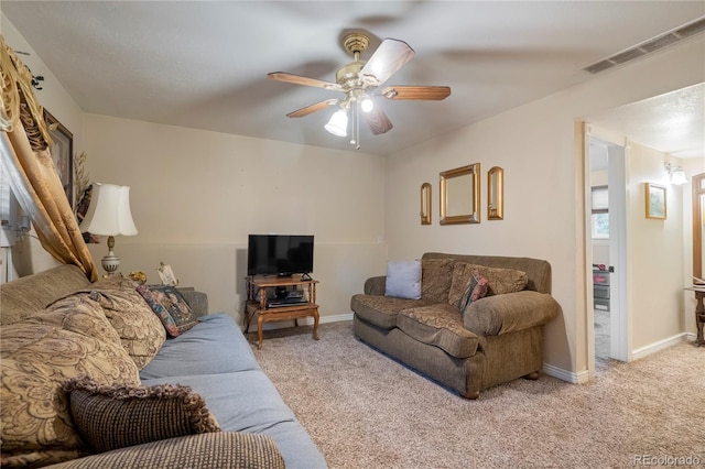 4345 S Chamberlin, Colorado Springs, CO 80906 - living area with light colored carpet, ceiling fan, and baseboards