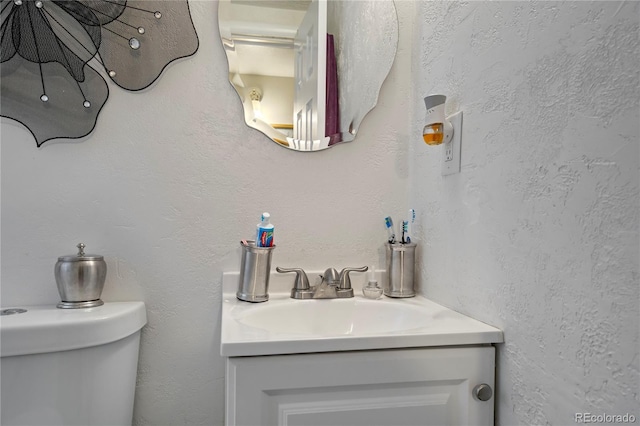 4345 S Chamberlin, Colorado Springs, CO 80906 - half bath featuring vanity and toilet