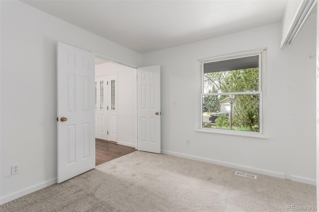 2026 S Pitkin St, Aurora, CO 80013 - unfurnished bedroom with carpet flooring and baseboards