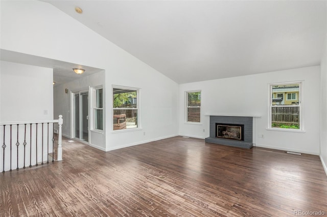 2026 S Pitkin St, Aurora, CO 80013 - unfurnished living room featuring wood finished floors, high vaulted ceiling, a fireplace, and baseboards