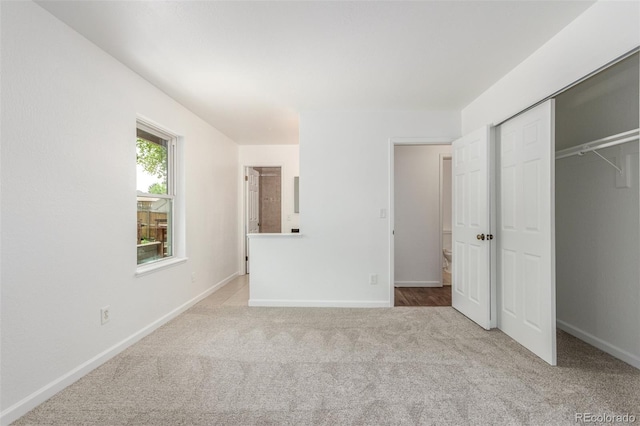 2026 S Pitkin St, Aurora, CO 80013 - unfurnished bedroom featuring carpet, baseboards, and a closet