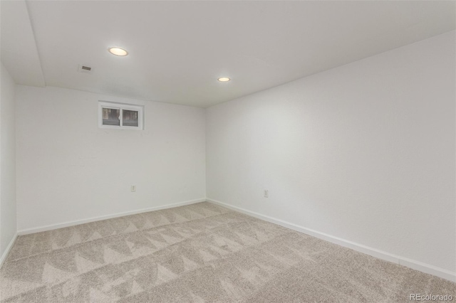 2026 S Pitkin St, Aurora, CO 80013 - empty room featuring light carpet, baseboards, and recessed lighting