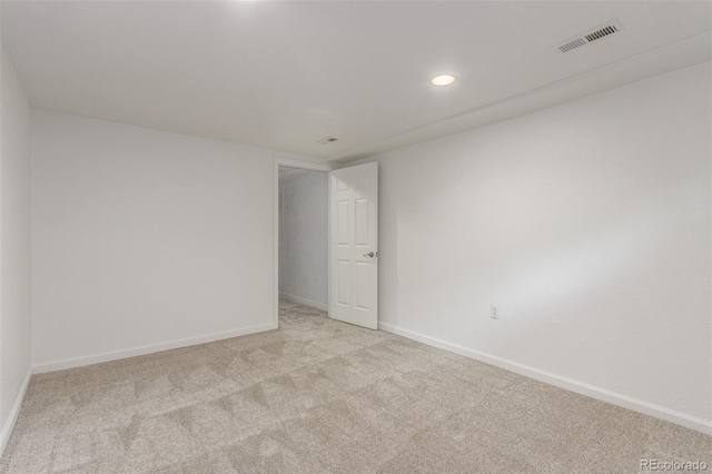 2026 S Pitkin St, Aurora, CO 80013 - unfurnished room featuring light carpet, baseboards, and recessed lighting