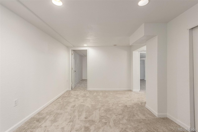 2026 S Pitkin St, Aurora, CO 80013 - finished basement featuring light carpet, recessed lighting, and baseboards