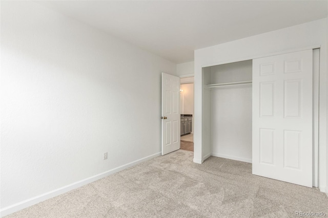 2026 S Pitkin St, Aurora, CO 80013 - unfurnished bedroom with carpet floors, baseboards, and a closet