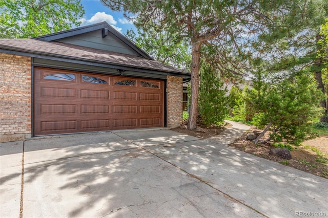2026 S Pitkin St, Aurora, CO 80013 - garage with driveway