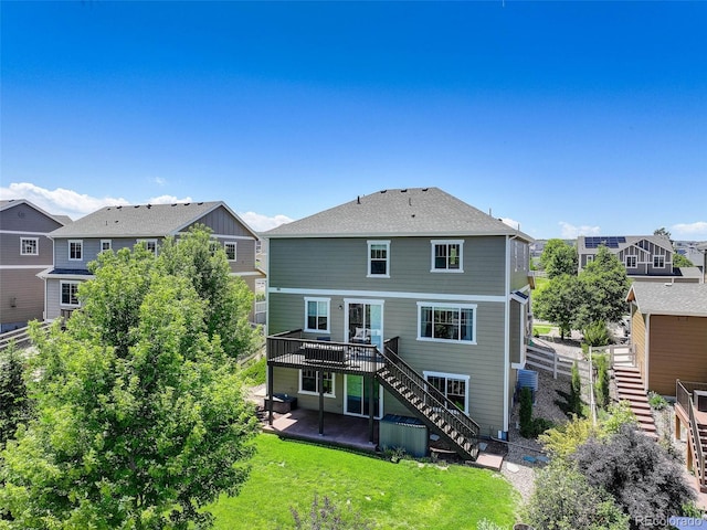 5528 Echo Hollow St, Castle Rock, CO 80104 - back of property featuring stairs, a patio area, a wooden deck, and a residential view