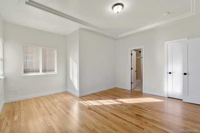 unfurnished room with light hardwood / wood-style floors