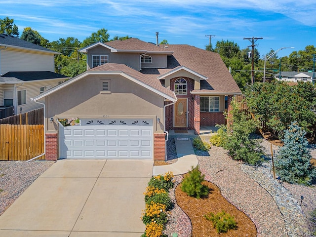 view of front of home with a garage