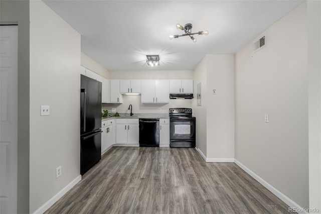 8843 Colorado Blvd Unit 208, Thornton, CO 80229 - kitchen featuring black appliances, light countertops, white cabinets, and wood finished floors