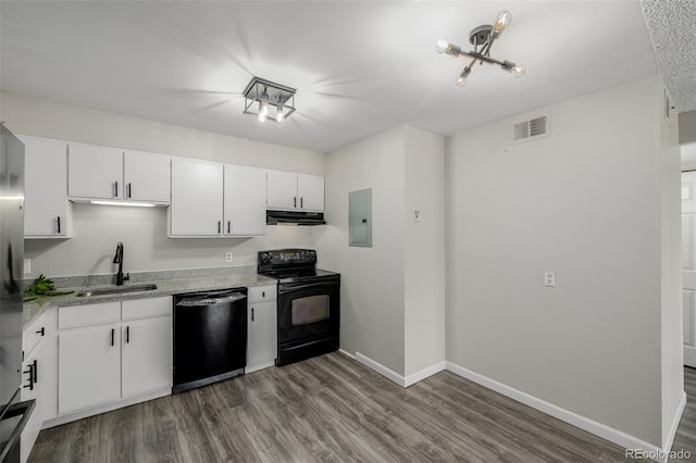 8843 Colorado Blvd Unit 208, Thornton, CO 80229 - kitchen featuring black appliances, under cabinet range hood, electric panel, dark wood-type flooring, and white cabinets