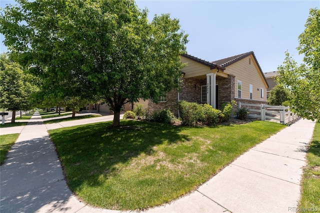 24664 E Louisiana Cir, Aurora, CO 80018 - view of property exterior with brick siding and a garage