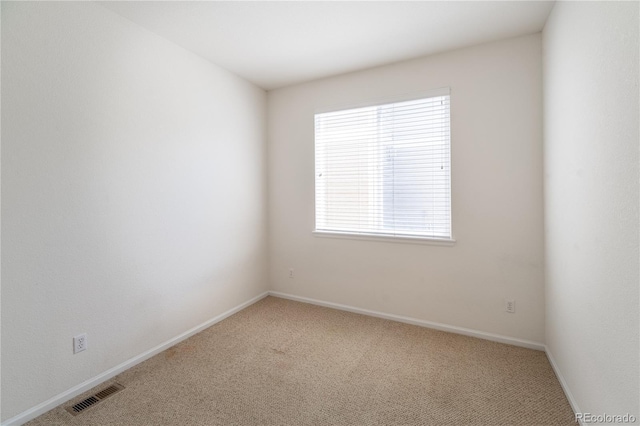 24664 E Louisiana Cir, Aurora, CO 80018 - empty room with light colored carpet and baseboards