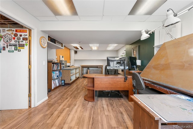 9638 Marion Way, Thornton, CO 80229 - office area featuring wood finished floors and a paneled ceiling