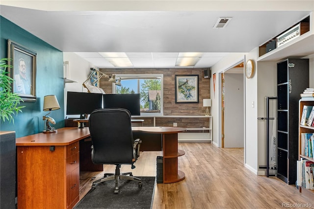 9638 Marion Way, Thornton, CO 80229 - office space with light wood-style floors, a paneled ceiling, and baseboards