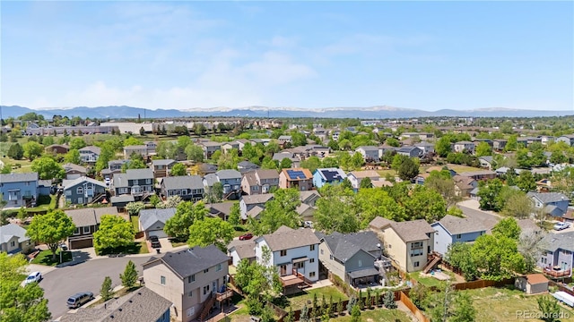 9638 Marion Way, Thornton, CO 80229 - aerial view of residential area featuring a mountainous background