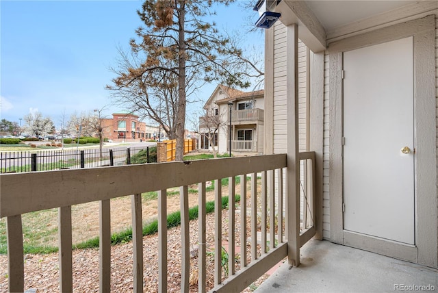 balcony featuring a residential view