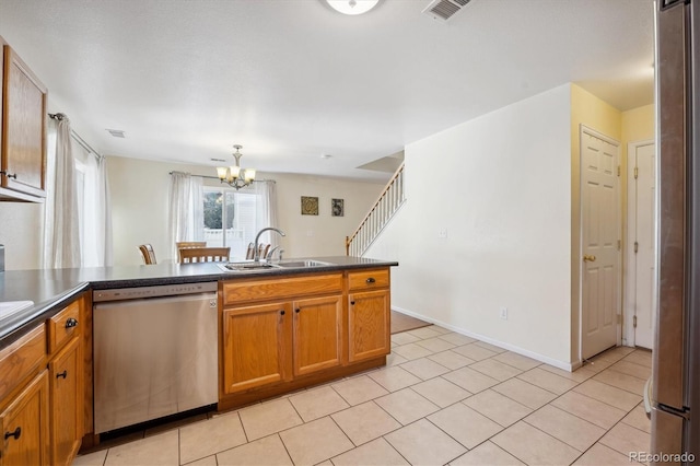 kitchen featuring dishwasher, sink, light tile patterned floors, a notable chandelier, and kitchen peninsula