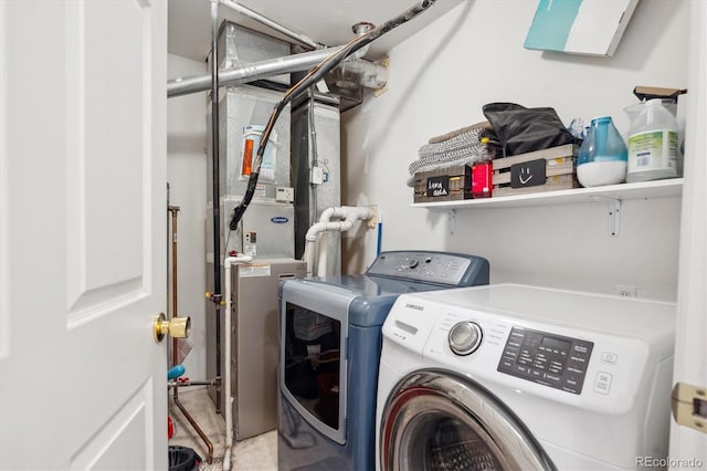 laundry area featuring washing machine and dryer