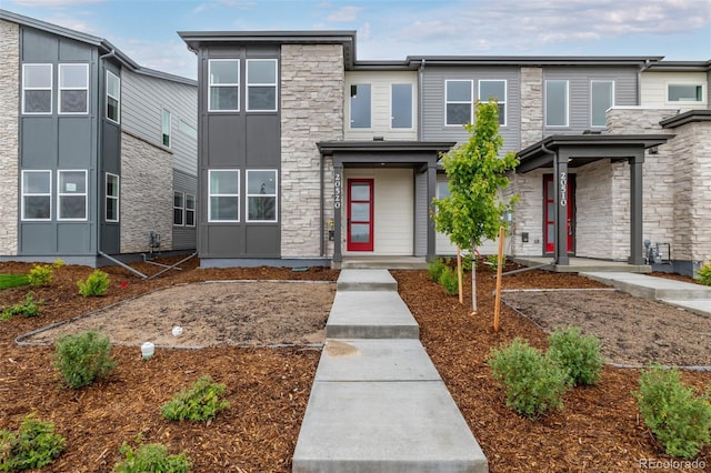 20520 E 58th Ave, Aurora, CO 80019 - view of front facade with stone siding