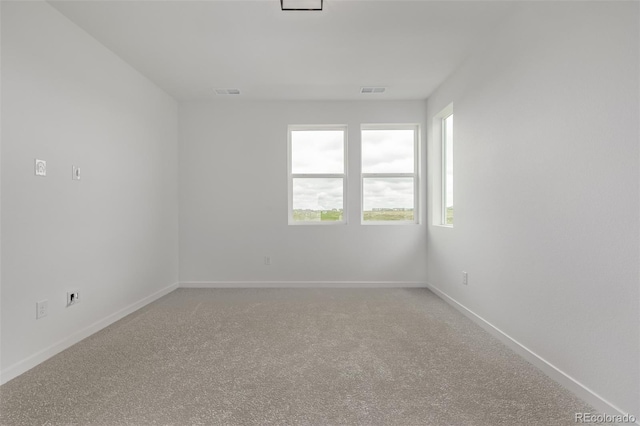 20520 E 58th Ave, Aurora, CO 80019 - empty room featuring baseboards and light colored carpet
