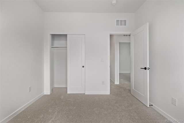 20520 E 58th Ave, Aurora, CO 80019 - unfurnished bedroom with carpet floors, baseboards, and a closet