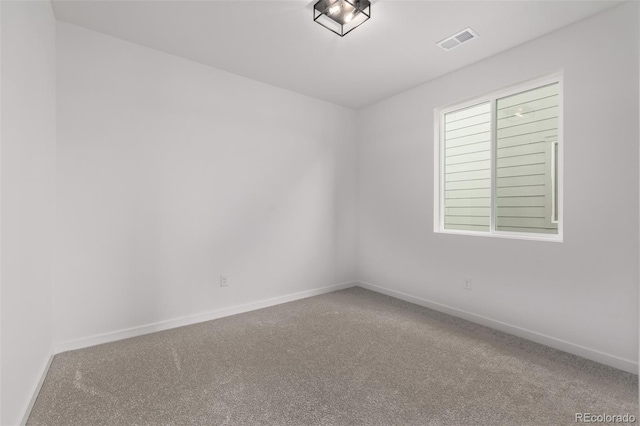 20520 E 58th Ave, Aurora, CO 80019 - carpeted spare room featuring baseboards