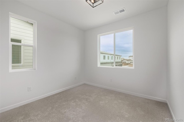 20520 E 58th Ave, Aurora, CO 80019 - carpeted spare room with baseboards