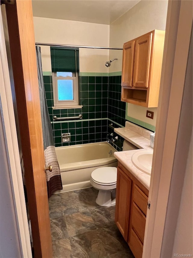 2124 S Yates St, Denver, CO 80219 - full bathroom with shower / tub combo with curtain, toilet, and vanity