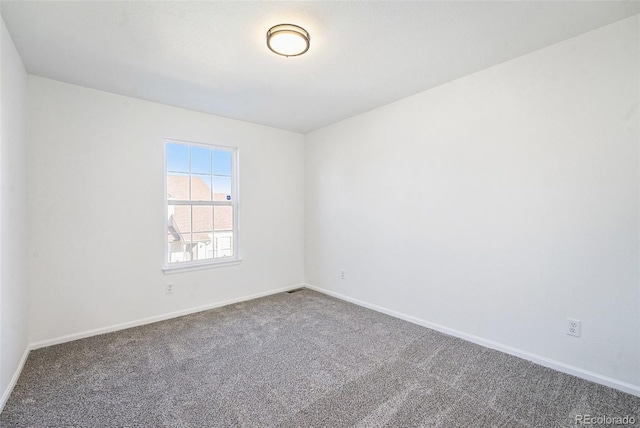 view of carpeted spare room