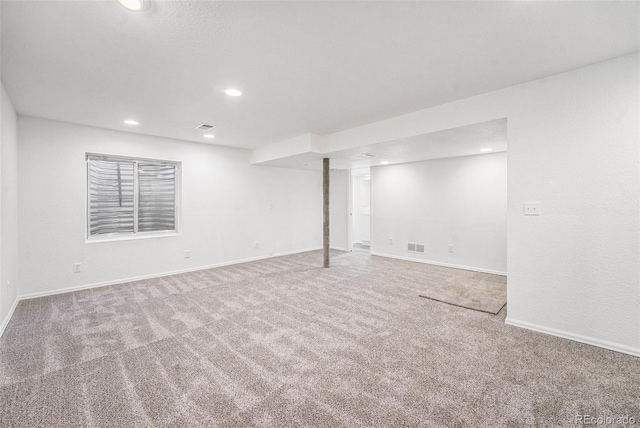 basement featuring carpet flooring