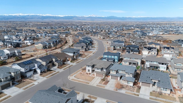 aerial view featuring a mountain view and a residential view