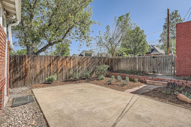 view of patio featuring a fenced backyard