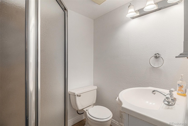 bathroom featuring sink and toilet